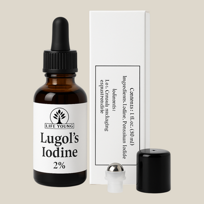 TuanaShop BV Lugol's Iodine 2% druppelflesje met bijbehorende verpakking en roller-opzetstuk op witte achtergrond.