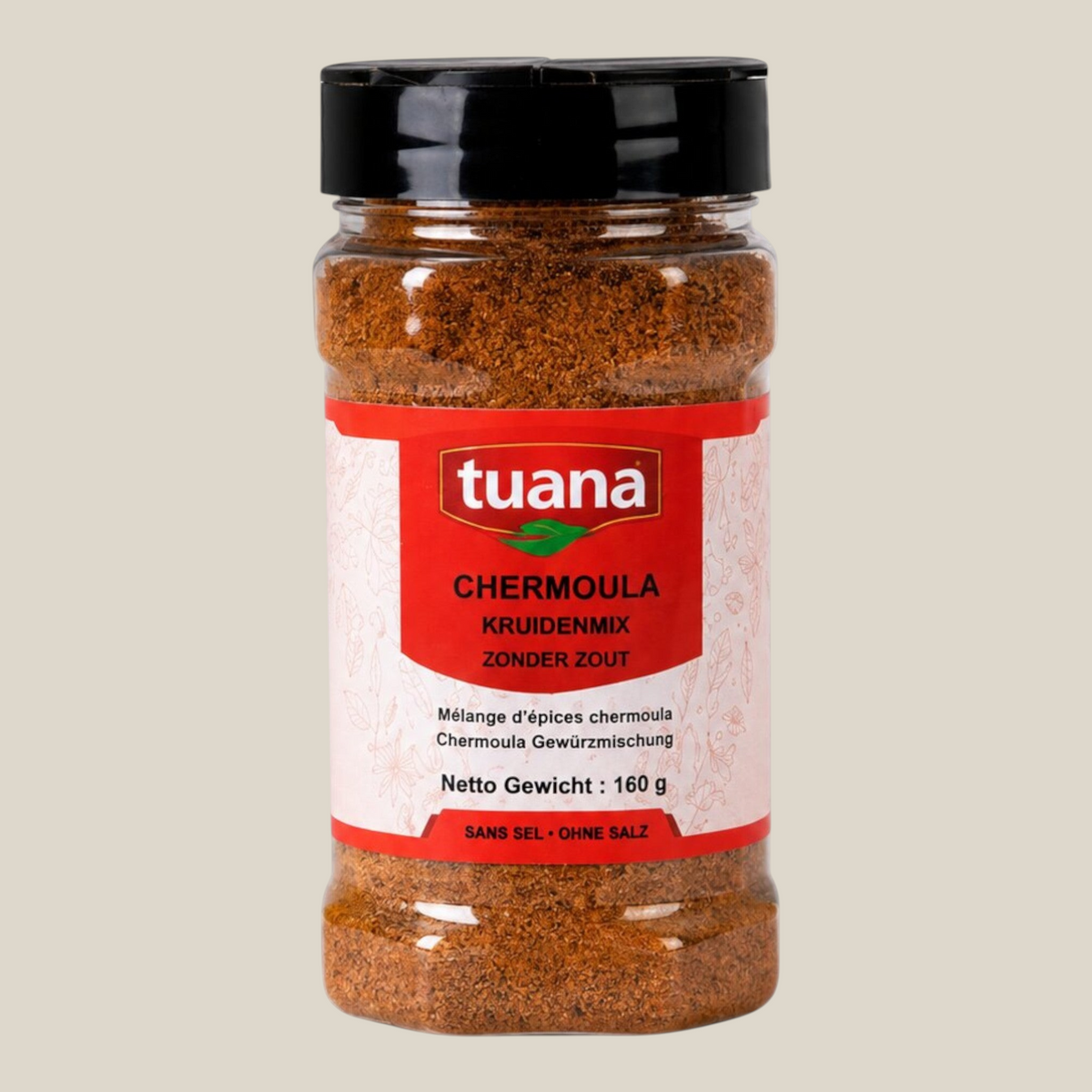 TuanaShop BV Chermoula kruidenmix zonder zout in een doorzichtige kruidenpot met zwart deksel en rood etiket.
