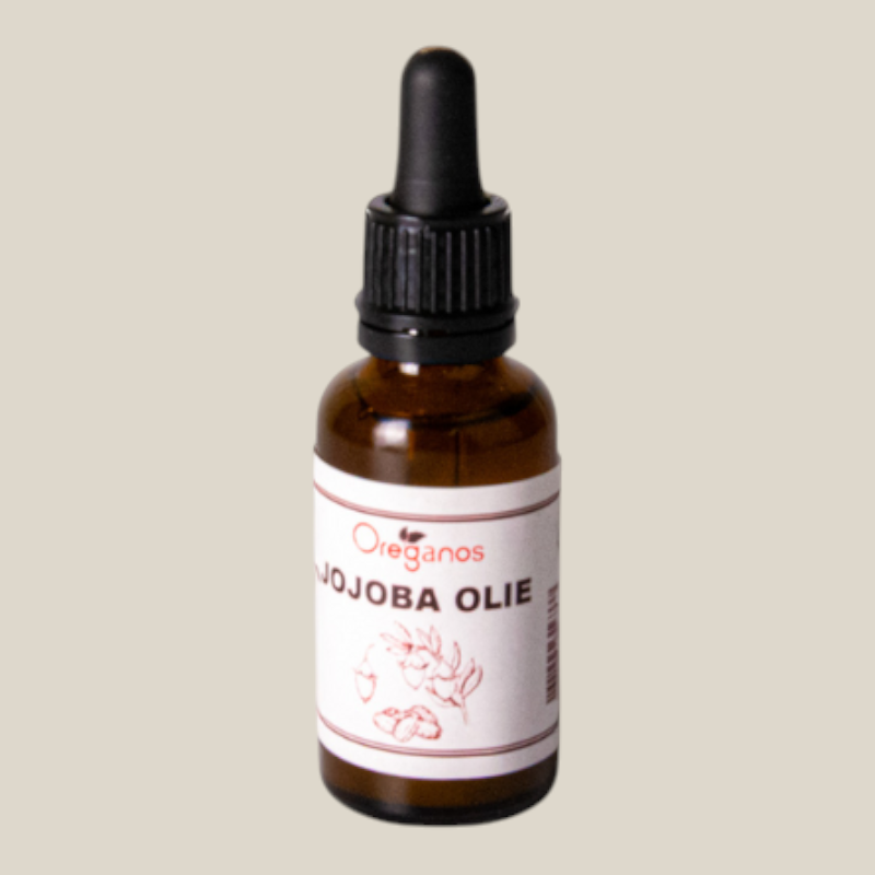 TuanaShop BV 100% pure koudgeperste jojobaolie in een bruin glazen flesje met pipet op een wit voetstuk