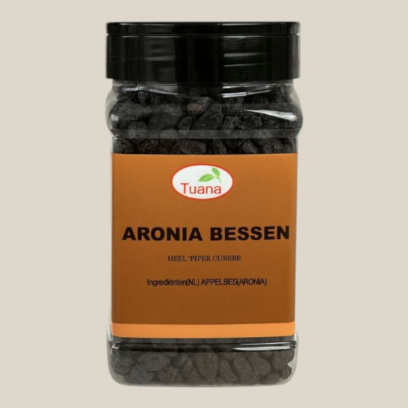 TuanaShop BV gedroogde aronia bessen in een transparante voorraadpot met zwart deksel.