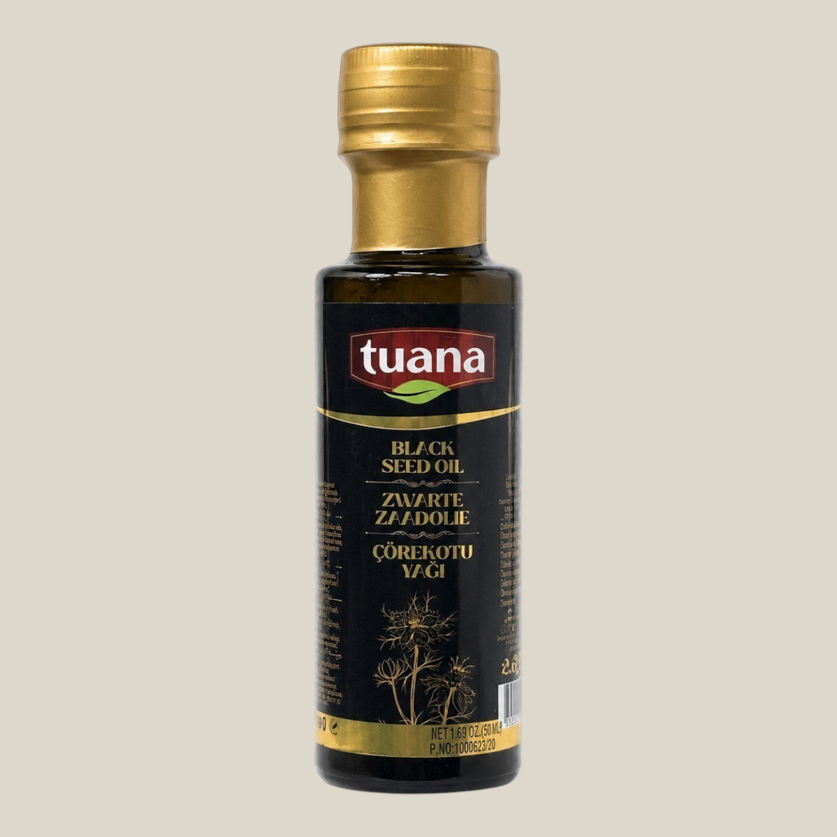 TuanaShop BV 100% biologische koudgeperste zwarte zaadolie in een glazen fles met gouden dop.
