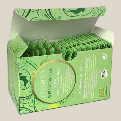 TuanaShop BV biologische Wellness thee met grapefruit en mate in een groene verpakking met 20 theezakjes
