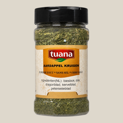 TuanaShop BV aardappel kruidenmix in een doorzichtige pot met groene kruiden zoals bieslook, dille en peterselie.