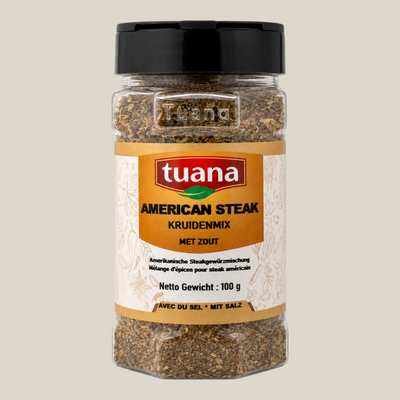 TuanaShop BV American Steak kruidenmix in een doorzichtige kruidenpot met zwart deksel en beige etiket.