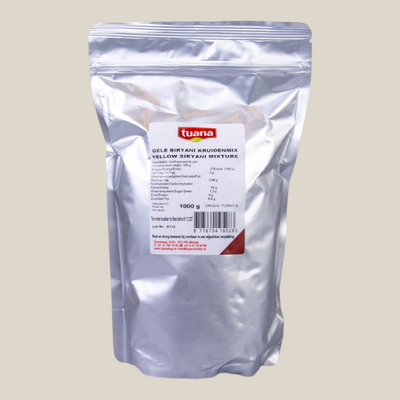 TuanaShop BV Gele Biryani Kruidenmix in een hersluitbare zilverkleurige verpakking van 1000 gram.