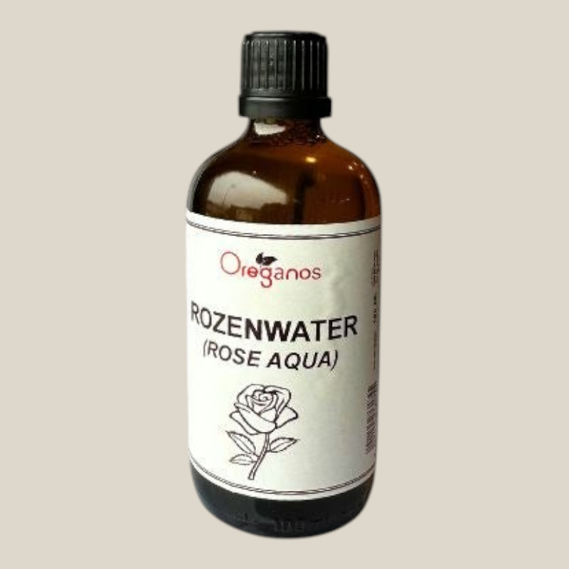 TuanaShop BV 100% organisch rozenwater in een bruine glazen fles van 100 ml voor huid- en haarverzorging.