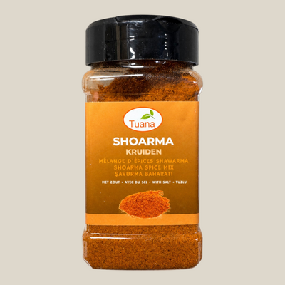 TuanaShop BV shoarma kruiden met zout in een doorzichtige kruidenpot met zwart deksel voor vlees en kip.