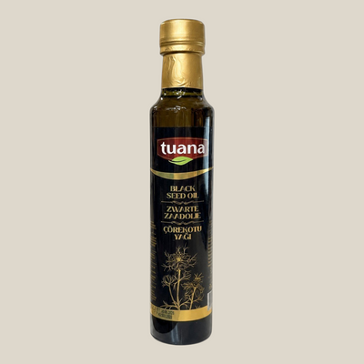 TuanaShop BV 100% biologische koudgeperste zwarte komijnzaadolie in een glazen fles van 250ml.