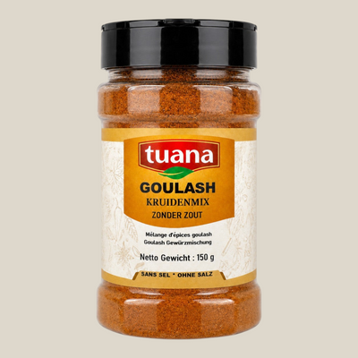 TuanaShop BV goulash kruidenmix zonder zout in een doorzichtige kruidenpot met zwart deksel