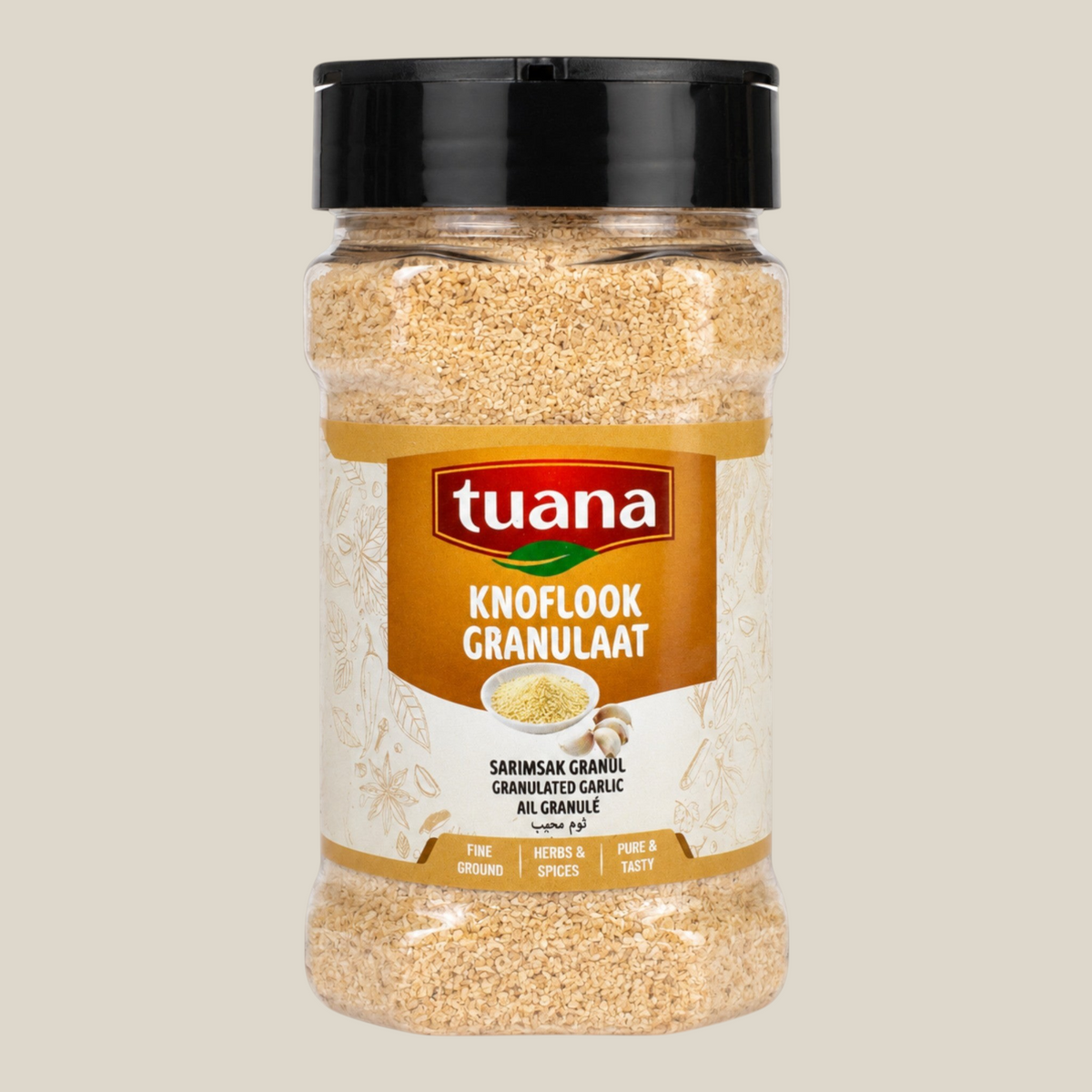 TuanaShop BV knoflook granulaat fijn in een doorzichtige kruidenpot met zwarte dop voor sauzen en marinades