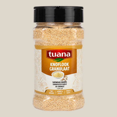 TuanaShop BV knoflook granulaat fijn in een doorzichtige kruidenpot met zwarte dop voor sauzen en marinades
