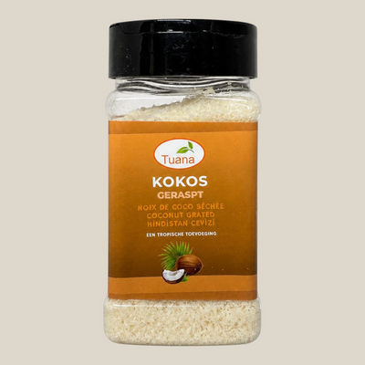 TuanaShop BV geraspte kokos in een doorzichtige kruidenpot met zwart deksel voor bakken en smoothies