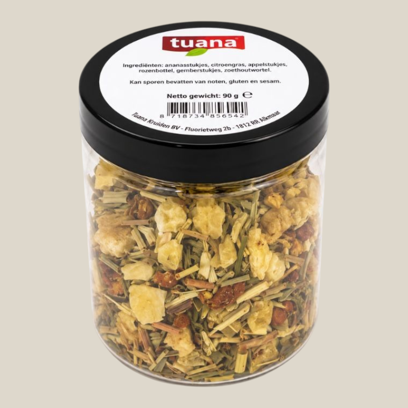 TuanaShop BV Love From the Caribbean zomer fruit thee in een doorzichtige pot met zwarte deksel en ingrediëntenlabel.