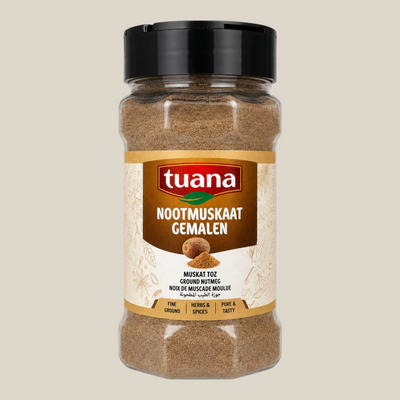 TuanaShop BV gemalen nootmuskaat in een doorzichtige kruidenpot met zwart deksel en beige etiket
