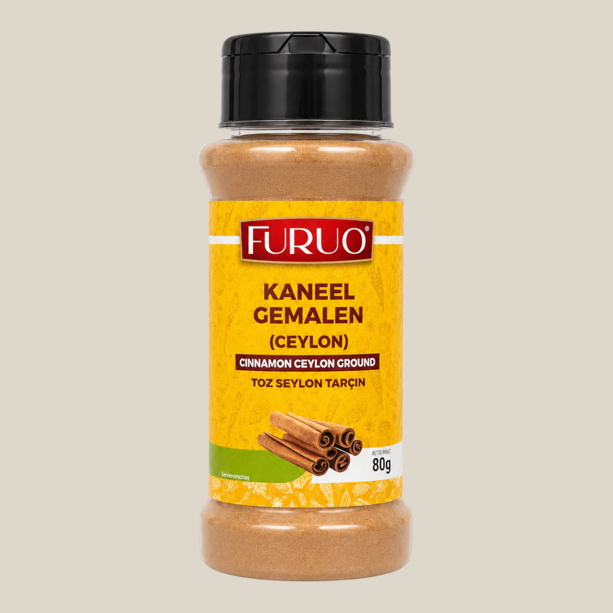 TuanaShop BV Furuo gemalen Ceylon kaneel in een doorzichtige kruidenpot met zwart deksel en geel etiket