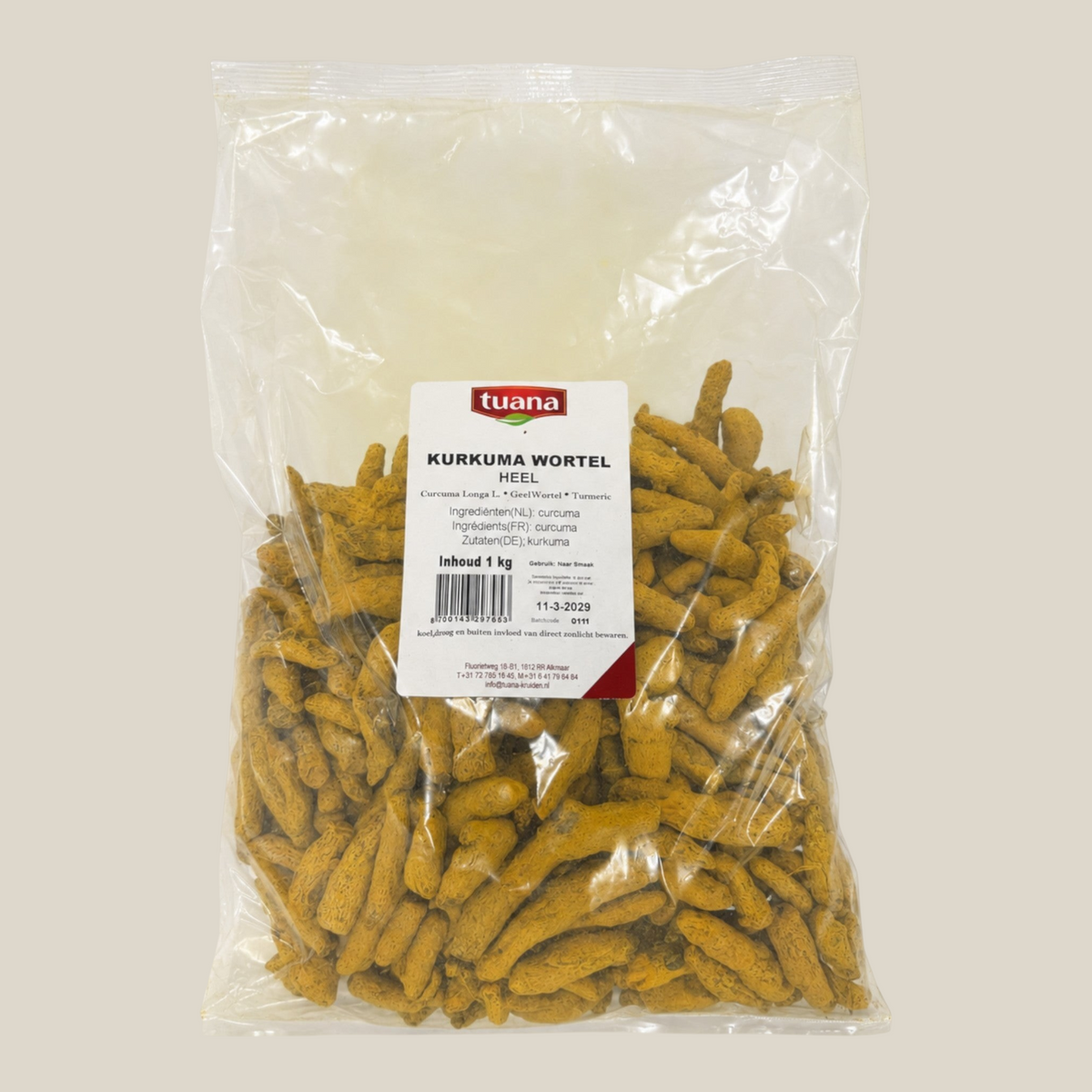 TuanaShop BV hele gedroogde kurkumawortels in een doorzichtige verpakking van 1 kilogram