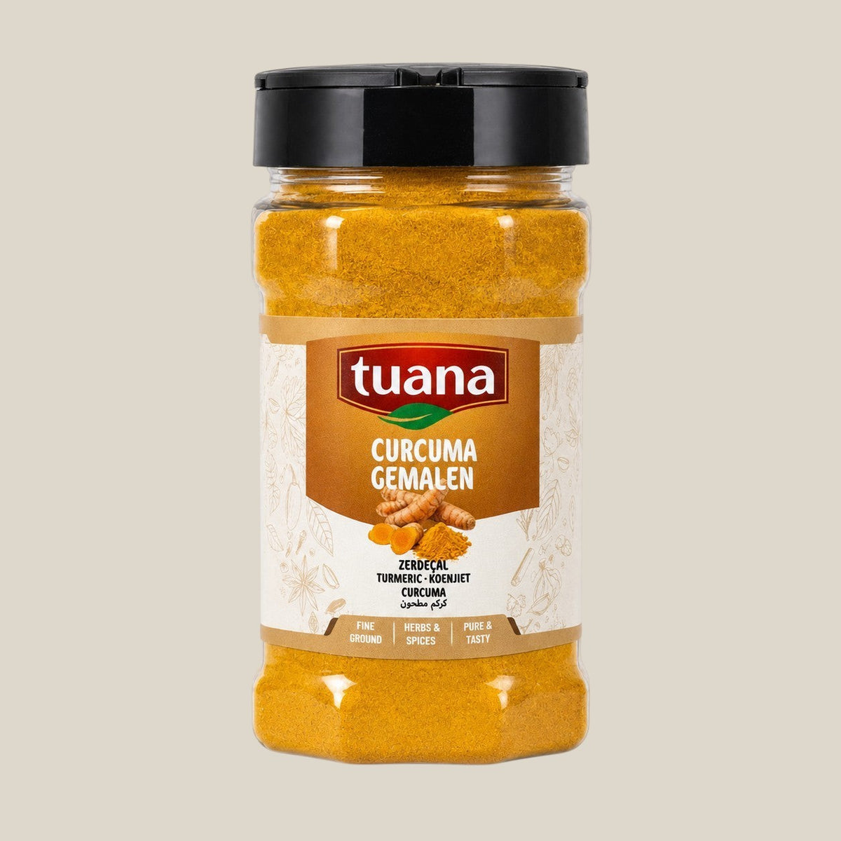 TuanaShop BV kurkuma gemalen in een doorzichtige kruidenpot met zwart deksel, rijk geel gekleurd poeder.